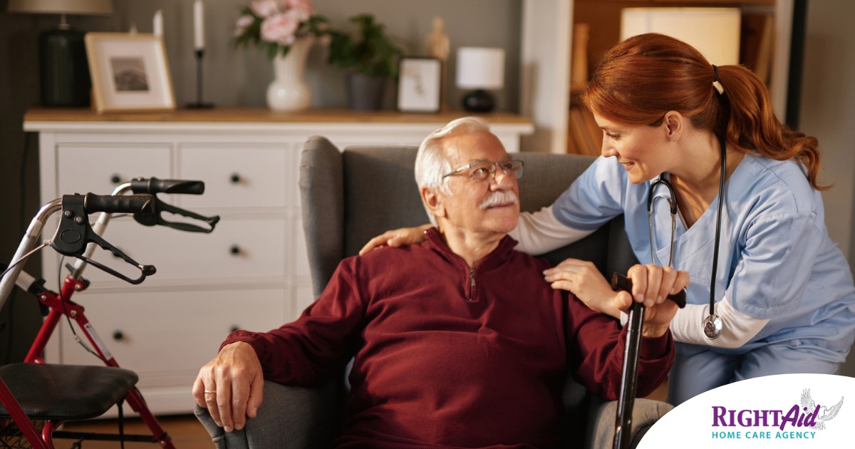A caregiver helping a woman with a walker make her senior home safer.