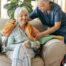 An aide provides home health care support for chronic conditions