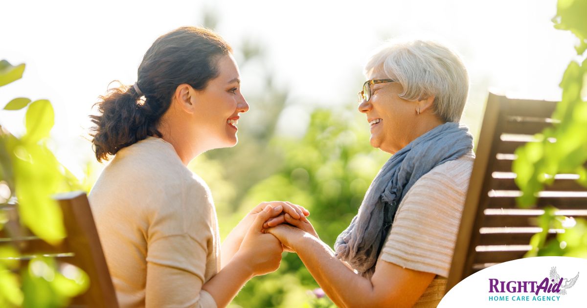 Caregiver provides at home senior services to an elderly loved one