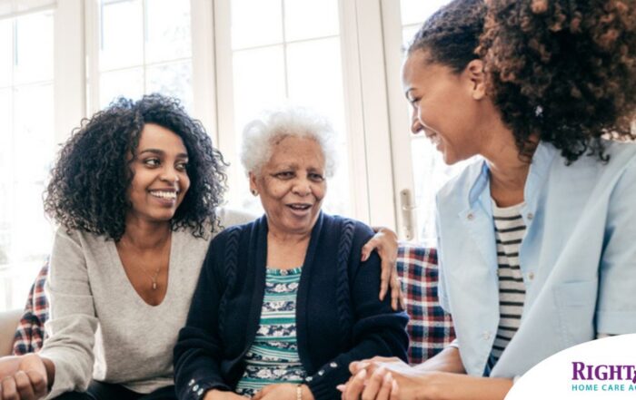Caregiver talking to a family about Elderly Care