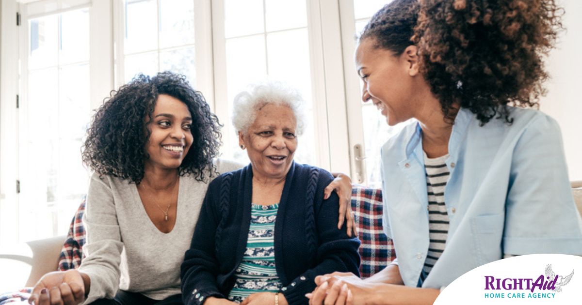 Caregiver talking to a family about Elderly Care